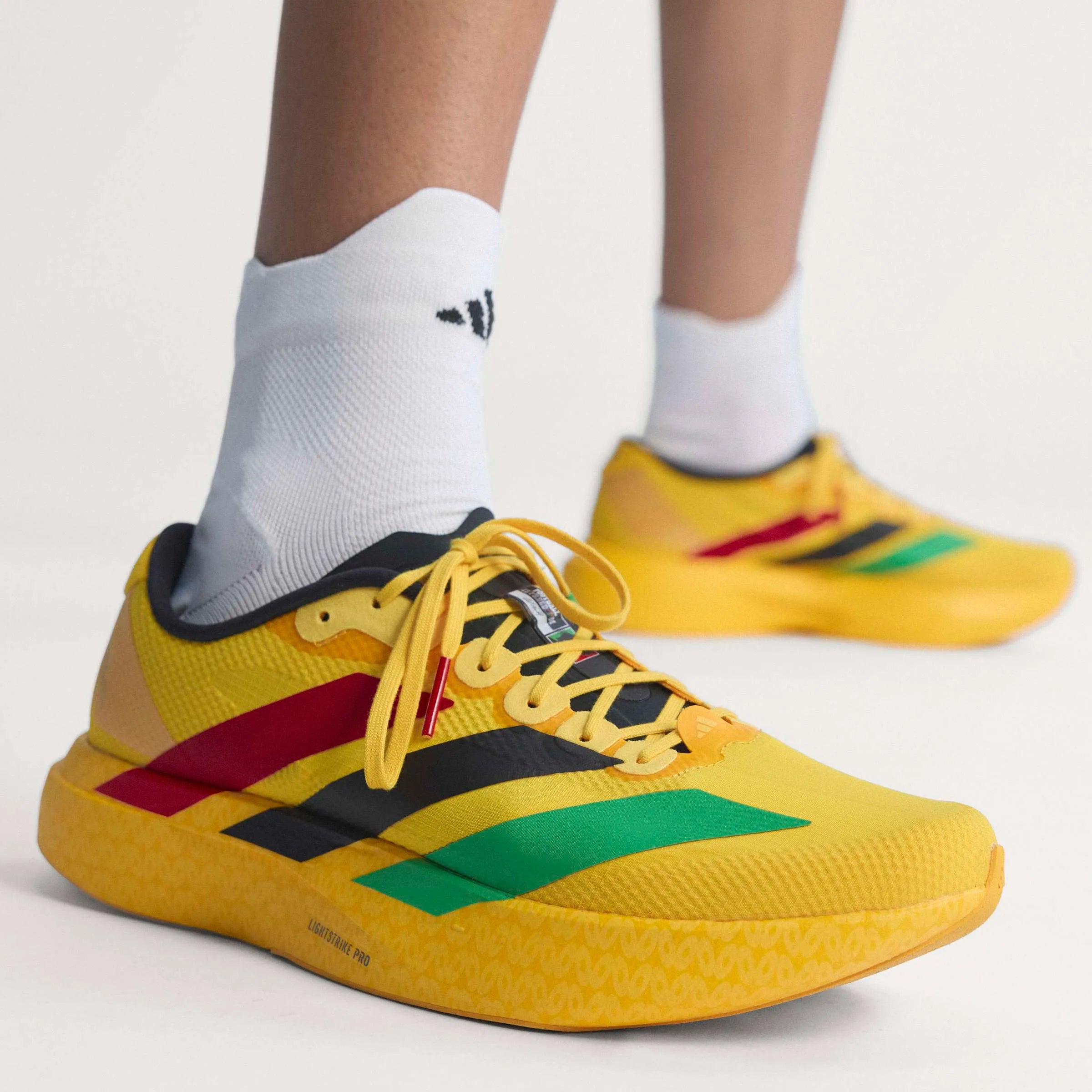 adidas Jamaica 26 x Bob Marley Adizero EVO SL Sneakers | thegoodlife. UAE