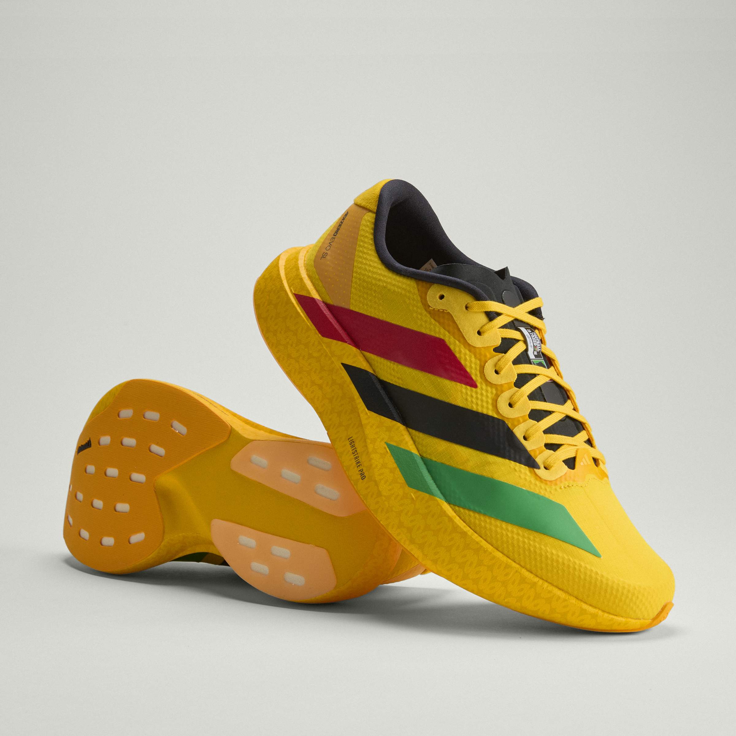 adidas Jamaica 26 x Bob Marley Adizero EVO SL Sneakers | thegoodlife. UAE