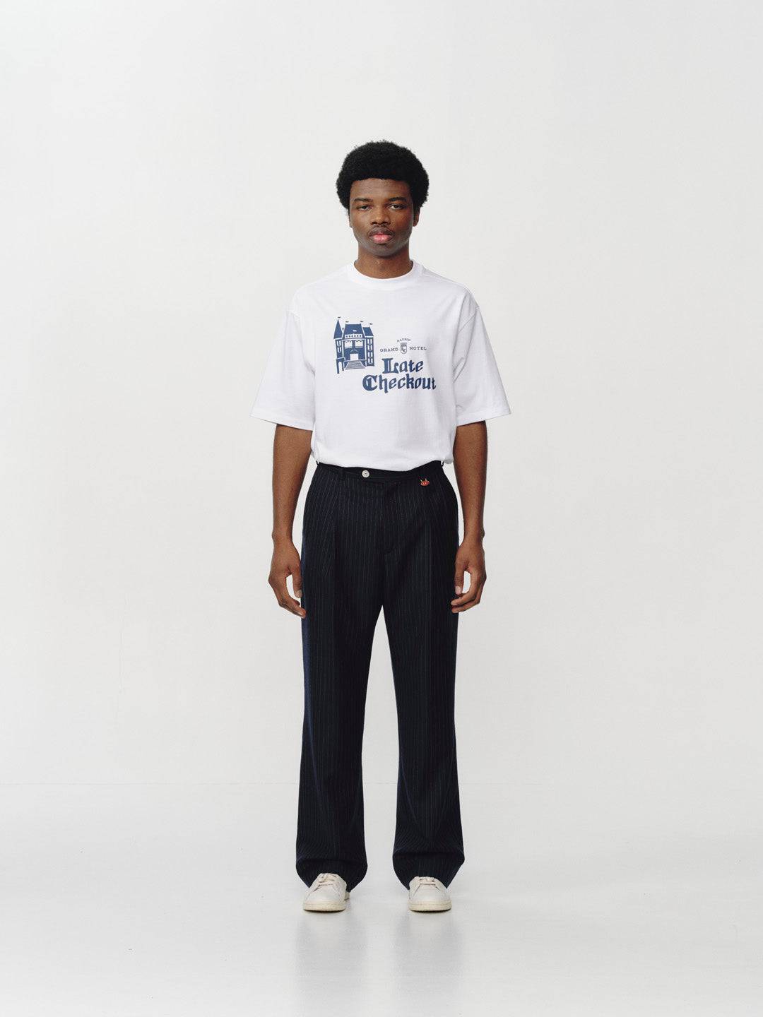 Late Checkout Navy Pinstripe Double Pleat Trousers | thegoodlife. UAE