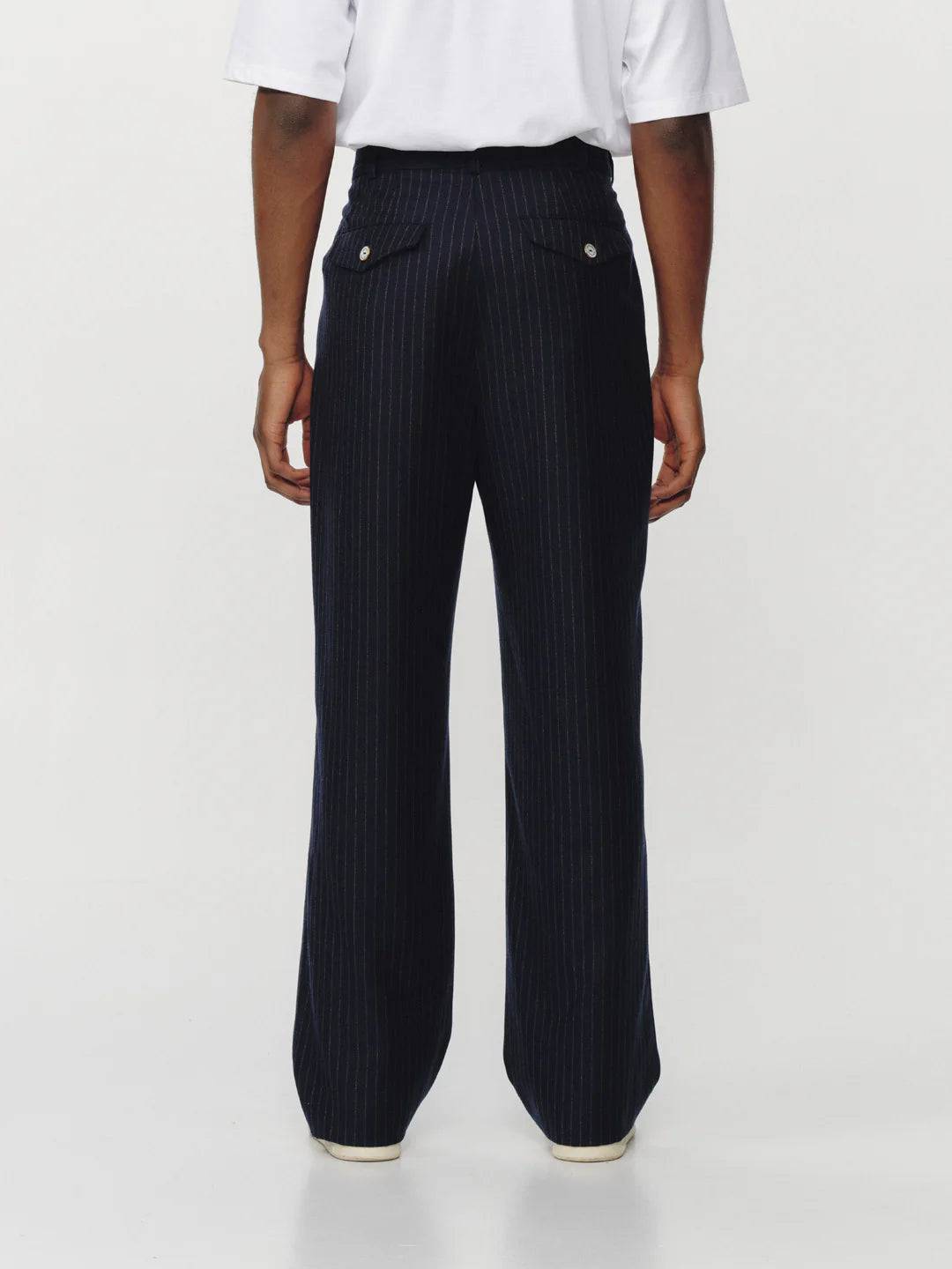 Late Checkout Navy Pinstripe Double Pleat Trousers | thegoodlife. UAE