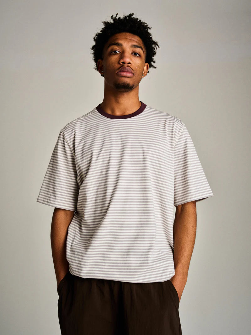 Pop Trading Company Striped Logo T-Shirt | thegoodlife. UAE