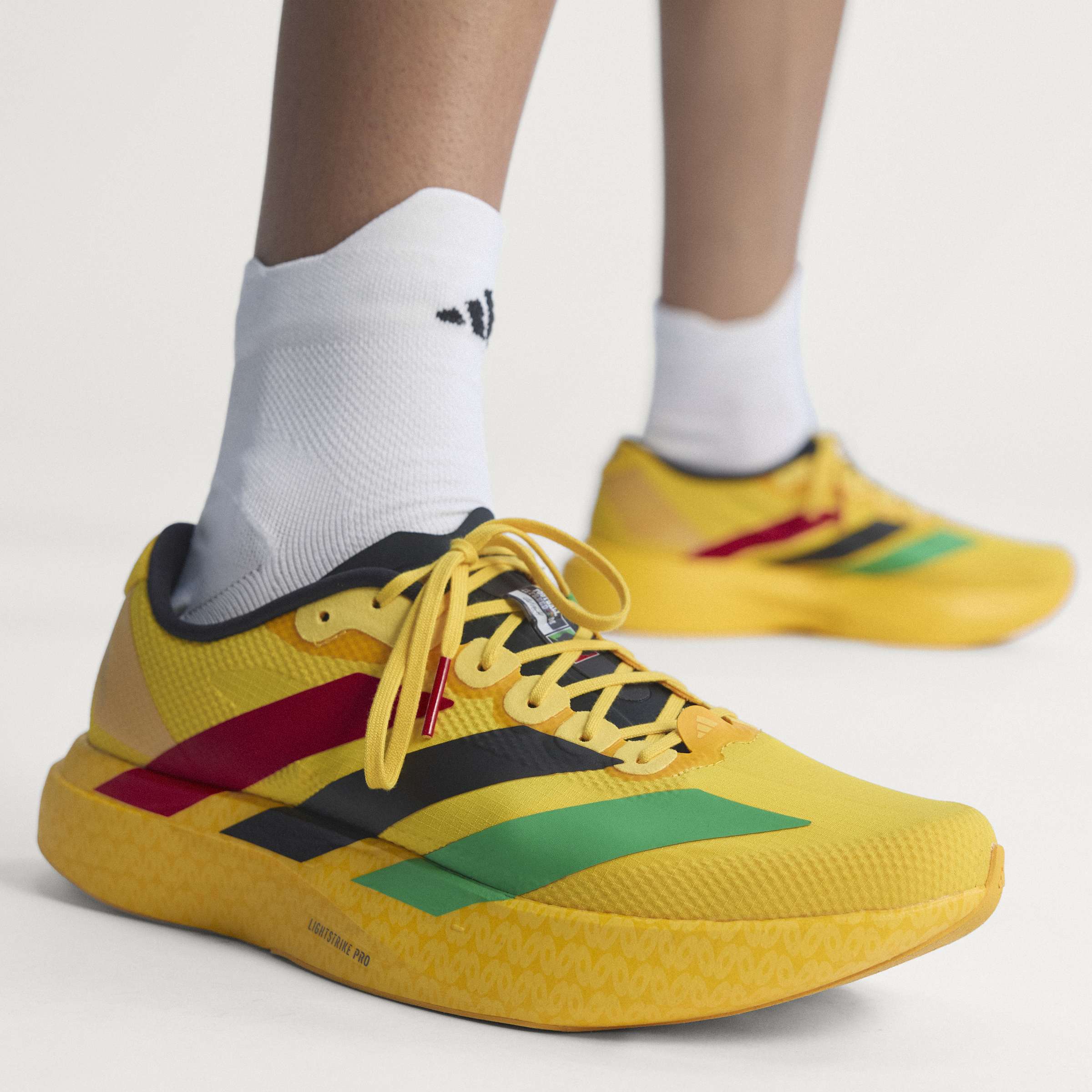 adidas Jamaica 26 x Bob Marley Adizero EVO SL Sneakers in Bold Gold / Vivid  Green / Pure Ruby for Men