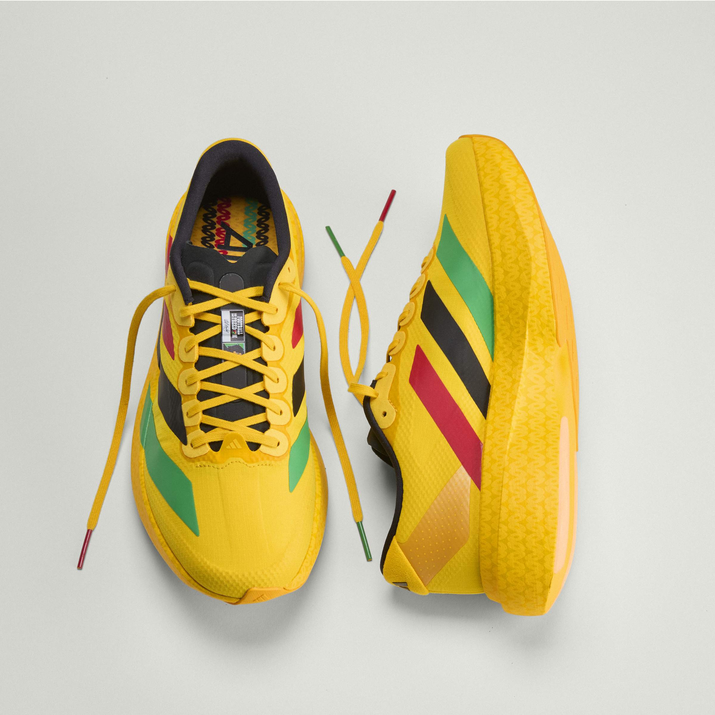 adidas Jamaica 26 x Bob Marley Adizero EVO SL Sneakers | thegoodlife. UAE